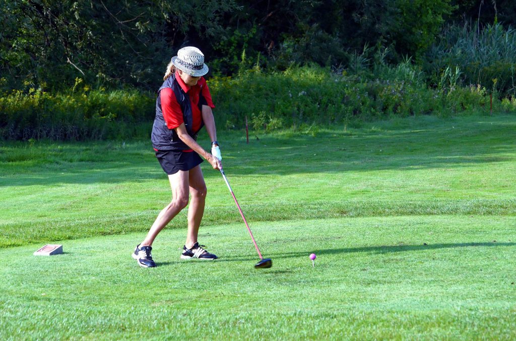 woman tee shot